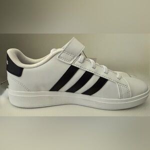 White Sneaker with Black Stripes